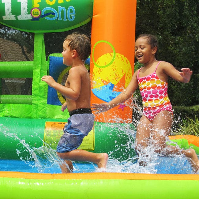 KidWise Endless Fun 11 in 1 Inflatable Bounce House with Waterslide - Backyard Marketplace